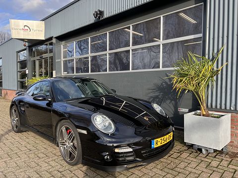 Porsche 997  911 hand geschakeld coupe 2007 zwart 481pk