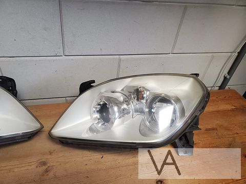 Opel Tigra 2004 - 2010 koplamp links zilver met ribbel €100