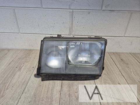 Koplamp links van Mercedes W124 E klasse 1985 - 1995 HELLA