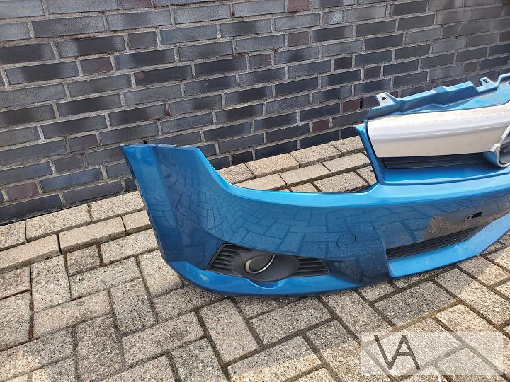Opel Tigra 2004 -2010 voorbumper licht blauw klein scheurtje – Foto 4