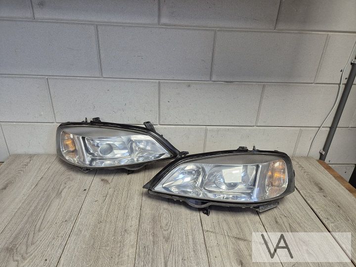 Opel Astra G 1998 - 2005 xenon koplamp set GEPOLIJST €200