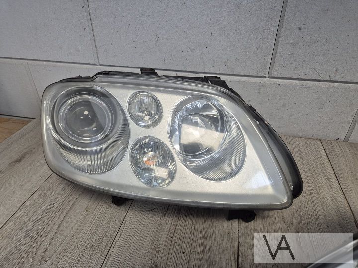 VW Touran 03-07 en Caddy 03-10 koplamp links xenon €100  – Foto 7